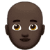 👨🏿‍🦲 man: dark skin tone, bald display on Apple